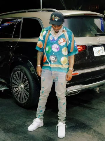 Chemise de billard Amiri Teal Green Allover portée par Real Boston Richey sur le compte Instagram @realbostonrichey