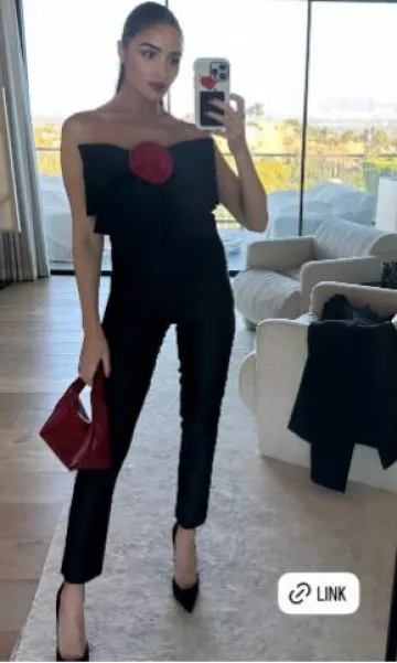 Alexia Maria Silk Faille Cigarette Pants worn by Olivia Culpo on her Instagram Story on December 16, 2024