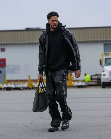 Prada Black Leather Belt Tote Bag worn by Tyrese Haliburton on the Instagram account @pacers