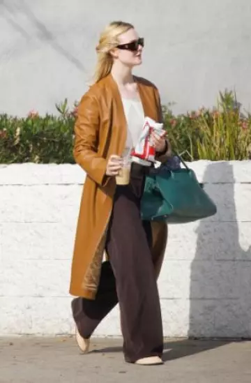 The Row Ew Margaux Bag worn by Elle Fanning at Studio City on December 23, 2024
