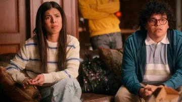 Mango Virginia Striped Jumper In Light Beige worn by Lindsey (Stephanie Branco) as seen in The Sex Lives of College Girls (S03E05)