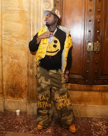 Kapital Green Camo Repair Service Cargo Pants worn by Sleepy Hallow on the Instagram account @_sleepyhallow_