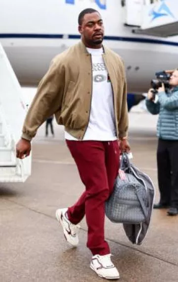 Fear Of God Deer Brown Wool Bomber Jacket worn by Chris Jones on the Instagram account @chiefs