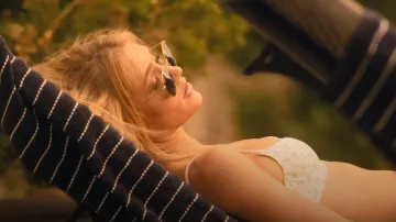 Ray Ban Round Metal Sunglasses worn by Ainsley Norris (Michelle Randolph) as seen in Landman (S01E04)