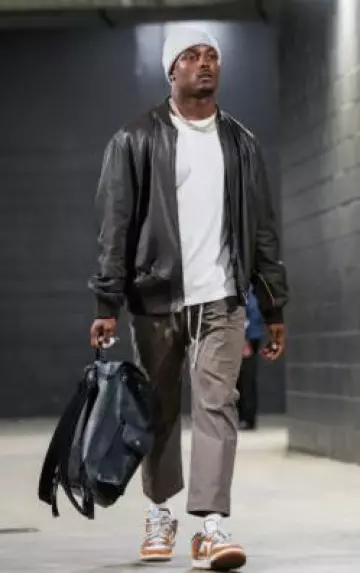 Louis Vuitton Black Leather Reversible Bomber Jacket worn by Jayden Daniels on the Instagram account @commanders