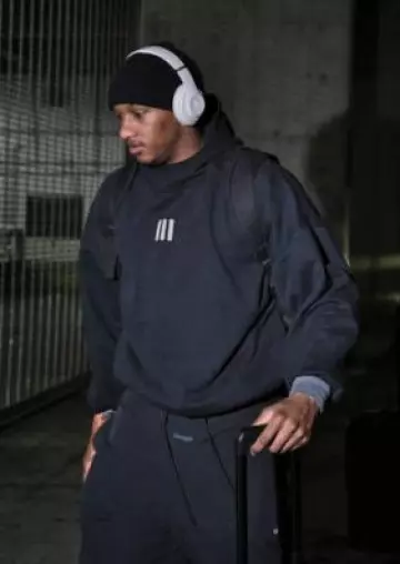 Adidas Fear Of God Athletics x Adidas Black Trackpants worn by Michael Penix Jr. on the Instagram account @commanders