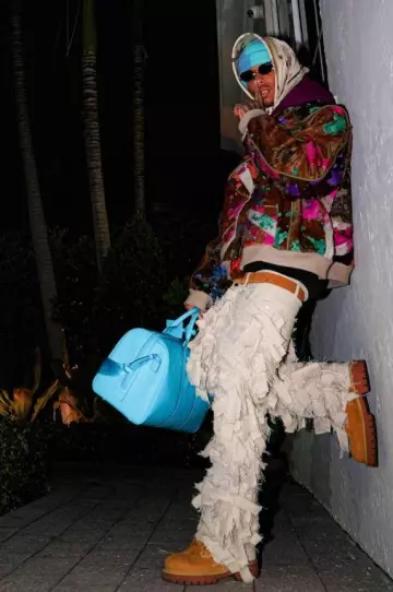 Louis Vuitton x Timberland 6" Boot Wheat usado por NLE Choppa en la cuenta de Instagram @nlechoppamusic