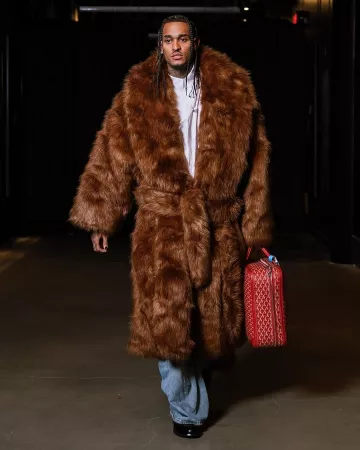 Entire Studios Brown Oversized Faux Fur Coat worn by Jordan Clarkson on the Instagram account @leaguefits