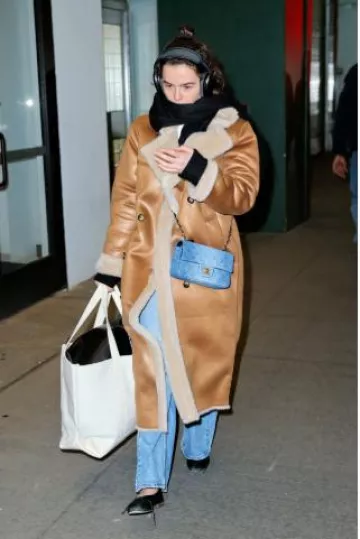 Chanel Classic Washed Denim Flap Bag worn by Zoey Deutch in New York City on December 30, 2024