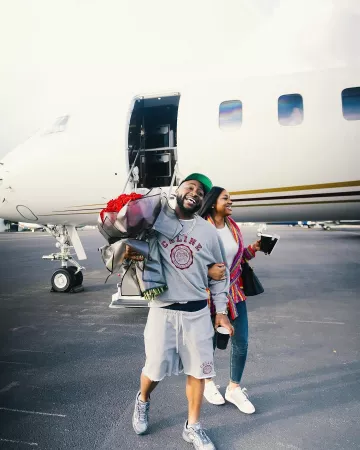 Celine Grey & Burgundy Seal Logo Sweatshorts worn by Davido on the Instagram account @davido