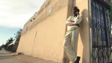 GOLF le FLEUR* White & Red Crest Logo Sweater worn by Tyler, The Creator in THAT GUY