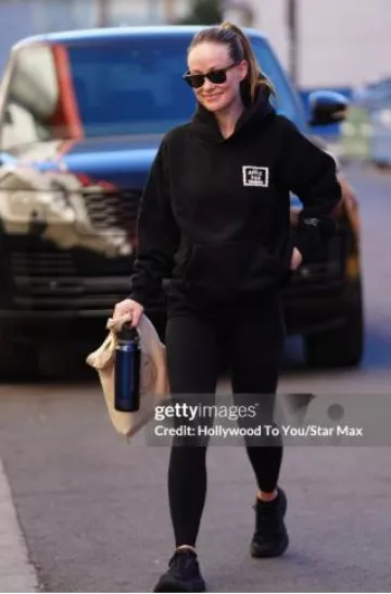 Hoka Bondi 8 Max Cushioned Road Running Shoes worn by Olivia Wilde in Los Angeles on January 6, 2025