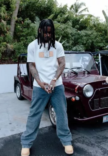 Louis Vuitton White Leather 'LV Lovers' Patch T-Shirt worn by Polo G on the Instagram account @polo.capalot