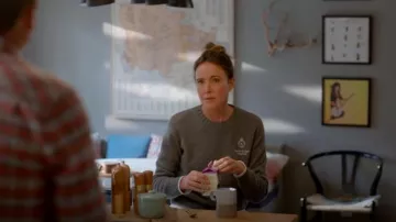 Sporty & Rich Crown Cashmere Crewneck worn by Liz (Christa Miller) as seen in Shrinking (S02E11)