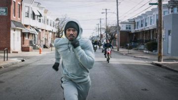 The gray Nike Air Jordan hoodie worn by Adonis Johnson (Michael B. Jordan) in the movie Creed: The Legacy of Rocky Balboa