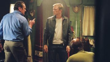 The replica of the leather jacket with red lining of XXXX (Daniel Craig) in Layer Cake