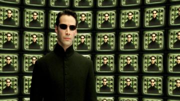 Abrigo largo de estilo gótico de Neo (Keanu Reeves) en The Matrix
