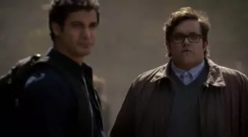 the gray sweater suit Sylvester Dodd (Ari Stidham) in Scorpio