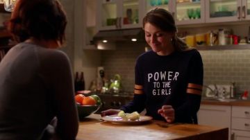 The H&M "Power to the Girls" sweater worn by Kara Danvers (Melissa Benoist) in the series Supergirl (Season 2 Episode 11)
