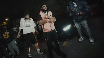 Moncler Light Pink 'Nubiera' Down Vest worn by BossMan Dlow in Ot7QUANNY FT. Bossman Dlow - "Bout My Money" (Official Video)