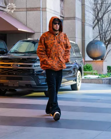 Carhartt Orange & Brown Camo Hooded worn by Devin Booker on the Instagram account @suns