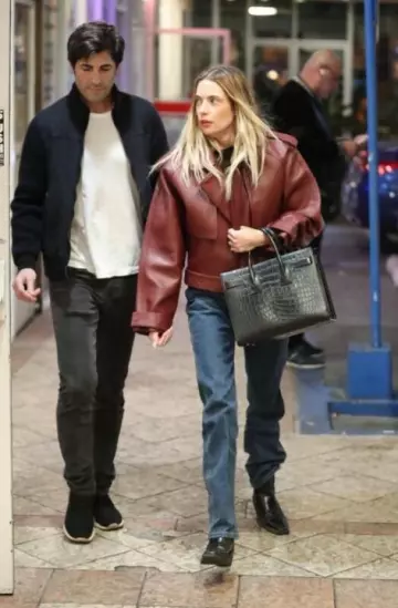 Saint Laurent Small Sac De Jour Bag Black in Crocodile-Embossed worn by Ashley Benson with Brandon Davis at Sushi Park January 23, 2025