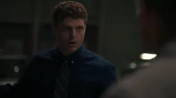 Brooks Brothers Argyle & Sutherland Rep Tie worn by Special Agent Bernard Randolf (Caleb Foote) as seen in NCIS: Origins (S01E05)