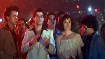 Peach Ruffle and Chiffon Dress worn by Stephanie (Karen Lynn Gorney) in Saturday Night Fever