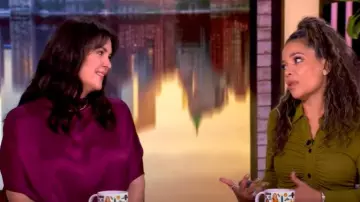 LaPointe Satin Cape T-Shirt worn by Melanie Lynskey as seen in The View on February 5, 2025