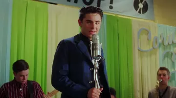 Blue and Black Poplin Suit with White Tie worn by Link Larkin (Zac Efron) in Hairspray
