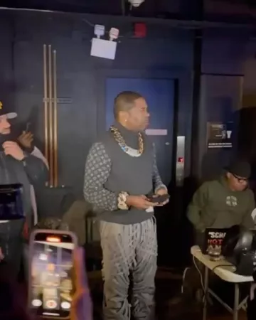 Louis Vuitton Dark Grey Monogram-Sleeve Turtleneck worn by Busta Rhymes on the Instagram account @bustarhymes