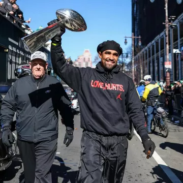 Love Hurts Printed Black Pullover Hoodie of Jalen Hurts on the Instagram account @philadelphiaeagles