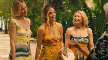 Valentino Garavani Vlogo Small Textured-Leather Shoulder Bag worn by Jaclyn Lemon (Michelle Monaghan) as seen in The White Lotus (S03E01)