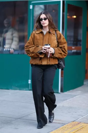 The Row Pim Bag in Leather worn by Hailey Bieber in New York City on January 30, 2025