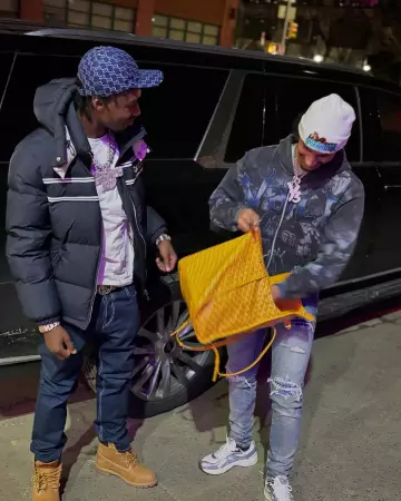 Gucci Navy Shadow-GG Hat worn by Lil Tjay on the Instagram account @liltjay