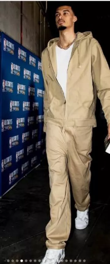 Nike Parachute Beige Hooded Work Jacket worn by Victor Wembanyama on the Instagram account @nbafashionfits