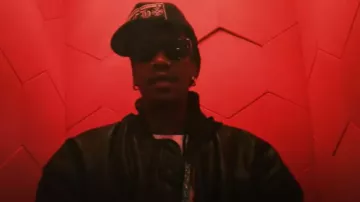 Balenciaga Black Leather DIY Metal Logo Hooded Bomber Jacket worn by Wiz Khalifa in Wiz Khalifa, Plaqueboy Max - Again [Official Music Video]