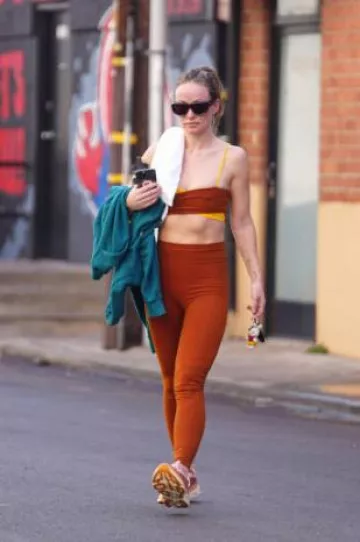 Live the Process Orion Bra in Clay Mineral Goldenrod worn by Olivia Wilde in Los Angeles on February 3, 2025