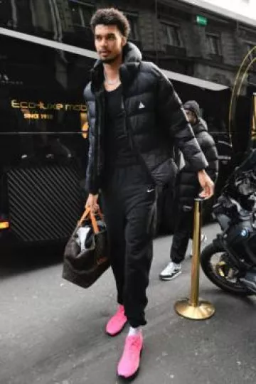 Louis Vuitton Brown Monogram Shopper Tote worn by Victor Wembanyama on the Instagram account @nbaeurope