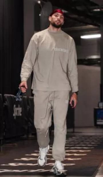 Fear Of God Seal Grey Logo Long Sleeve Mock T Shirt worn by Zach LaVine on the Instagram account @sixers