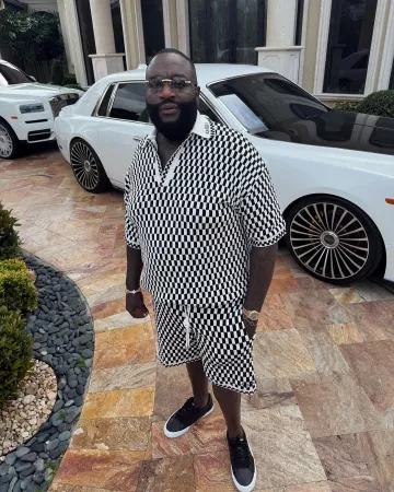 Amiri Black & White Stars Sunset Sneakers portées par Rick Ross sur le compte Instagram @richforever
