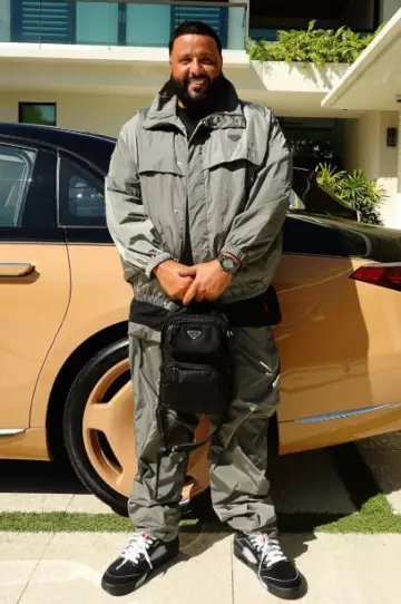 Prada Black Nylon Zip Pocket Sling Backpack worn by DJ Khaled on the Instagram account @djkhaled