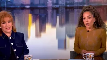 Zimmermann Stretch-corded lace Bodysuit worn by Sunny Hostin as seen in The View on February 25, 2025