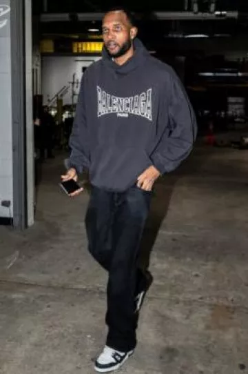 Louis Vuitton White & Black Denim LV Trainer Sneakers worn by Evan Mobley on the Instagram account @cavs