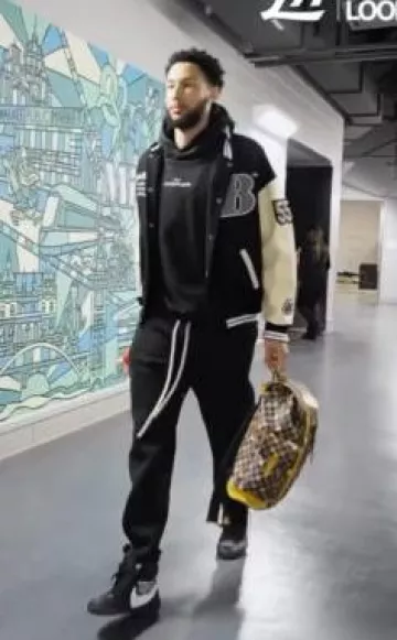 Louis Vuitton Brown & Multicolor Damier Christopher MM Backpack worn by Ben Simmons on the Instagram account @cavs