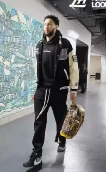 Maison Margiela Black Small Upside Down Logo Hoodie worn by Ben Simmons on the Instagram account @cavs