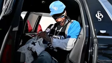 Balenciaga Washed Blue Graffiti Baggy Jeans worn by Wiz Khalifa in Wiz Khalifa - So Many Pounds Freestyle [Official Music Video]