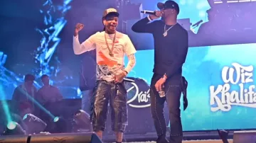 Martine Rose Dover Street Market White & Grey Camo T-Shirt worn by Wiz Khalifa in Wiz Khalifa - So Many Pounds Freestyle [Official Music Video]