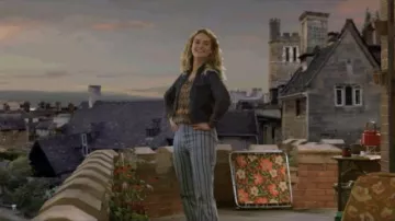 Flared light blue stripped jeans trousers worn by Young Donna (Lily James) as seen in Mamma Mia! Here We Go Again movie wardrobe 