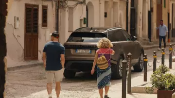 Backpack worn by Portia (Haley Lu Richardson) as seen in The White Lotus TV series (S02E07)